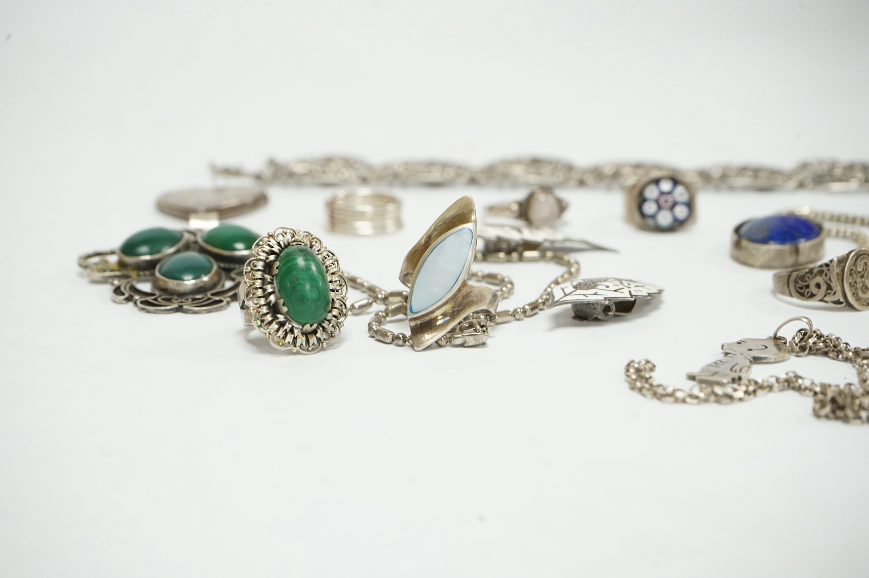 A small quantity of 925 and white metal jewellery including rings, bracelets and pendants. Condition - fair